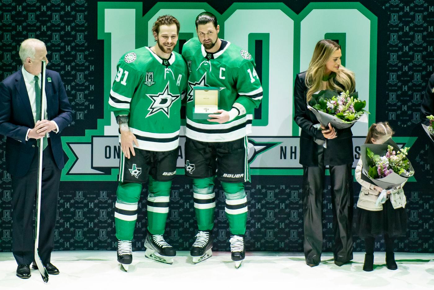 Dallas Stars left wing Jamie Benn (14) and center Tyler Seguin (91) stand together during a...