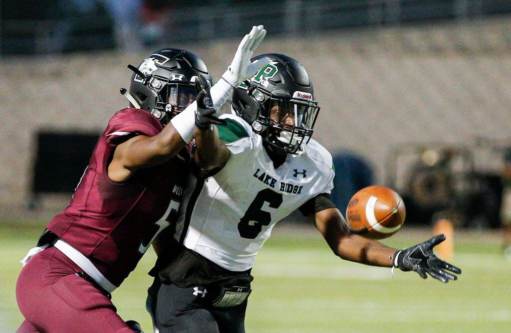TXHSFB Mansfield Lake Ridge senior wide receiver Cotis Martin (6) is unable to catch a pass as Mansfield Timberview senior defensive back Lance Sullivan (5) defends during the first half of a high school football game at Vernon Newsom Stadium in Mansfield, Friday, September 13, 2019. (Brandon Wade/Special Contributor)