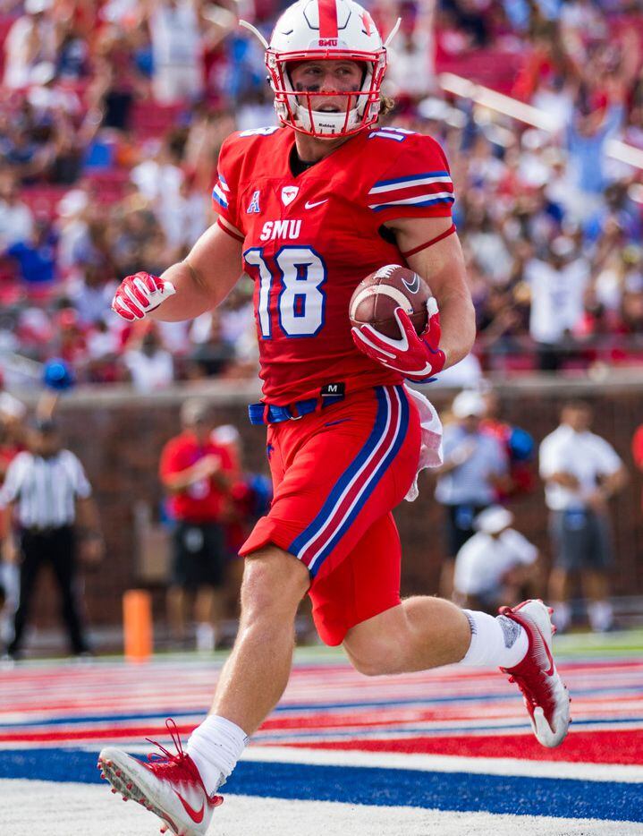 Southern Methodist Mustangs wide receiver Trey Quinn (18) runs through the end zone for a...