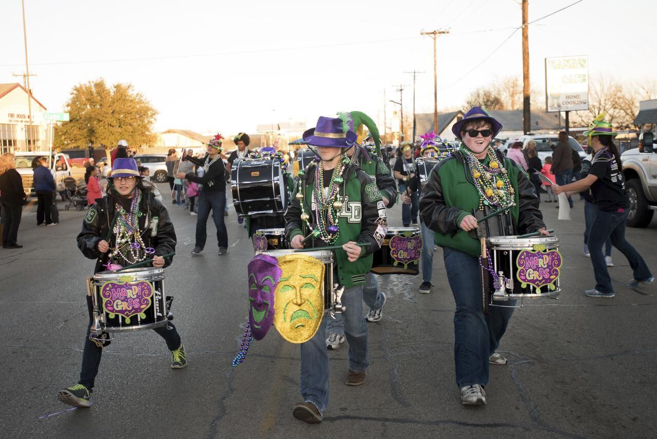 
The Lake Dallas High School Marching Band already had the green and added purple and gold...
