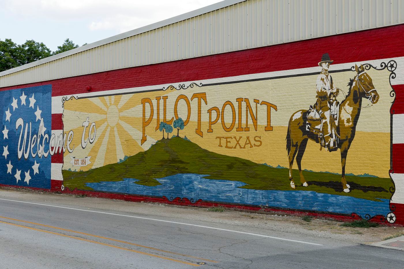 A mural welcomes people to Pilot Point.