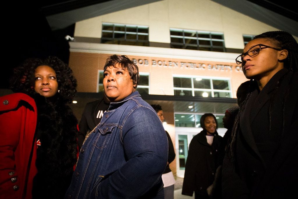 Jacqueline Craig (center) spoke about the incident with reporters outside Fort Worth police...