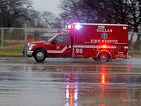 A Dallas Fire-Rescue ambulance heads off to a call in Dallas in Jan. 2019.