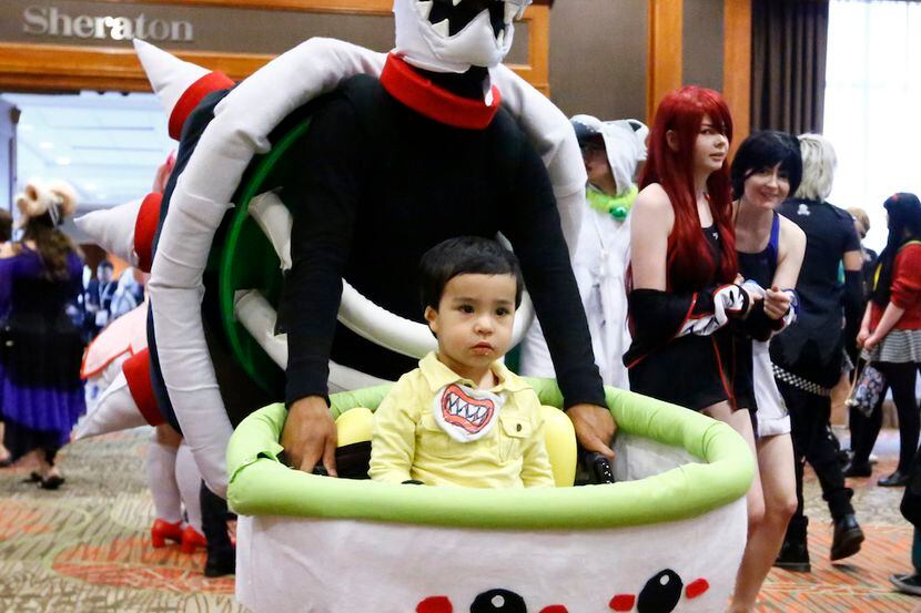 Mike Skellington as Dry Bowser and 18-month-old Darien Skellington as Bowser Jr. make their...
