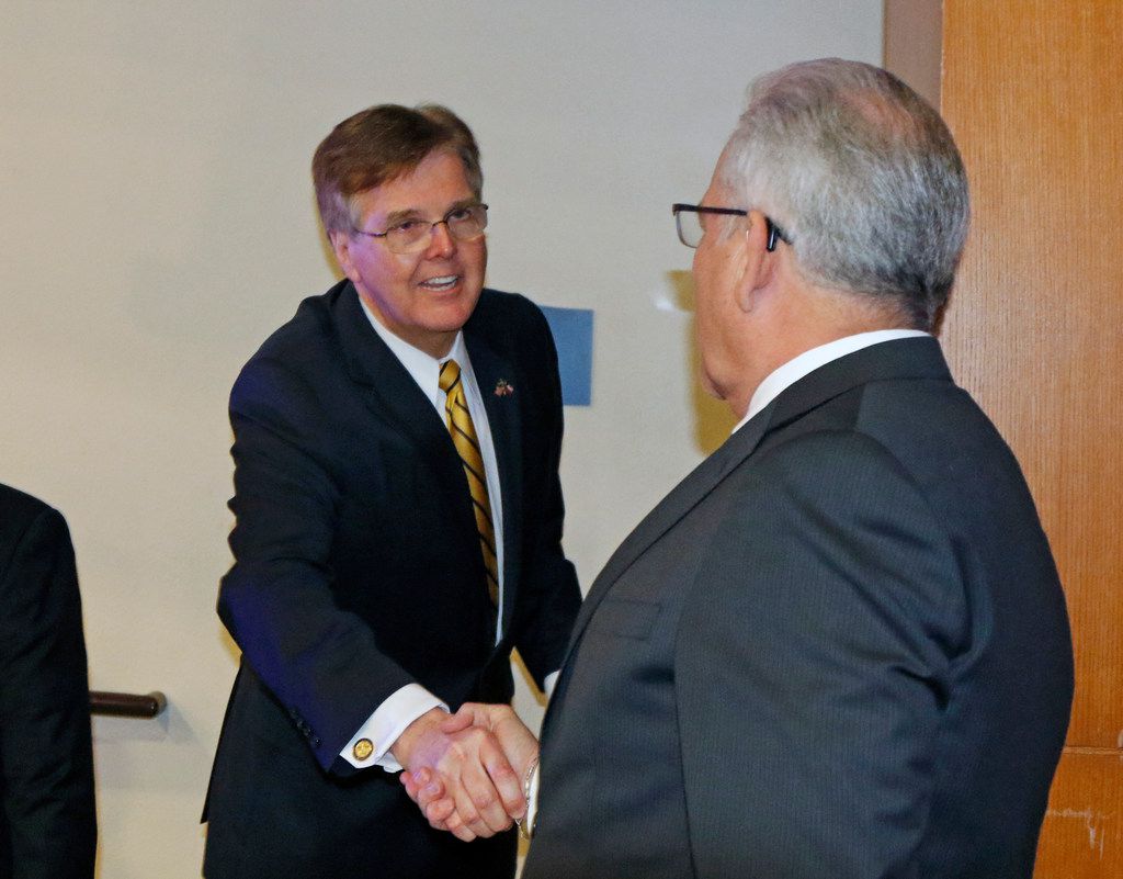 Lt Gov. Dan Patrick greets E. Ray Covey, advisory Committee Chair after giving his speech....