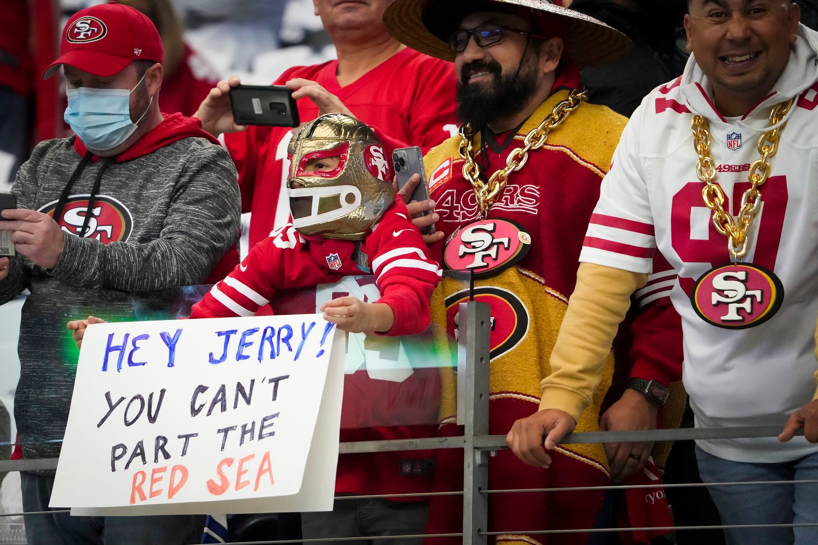 San Francisco 49ers fans watch the teams warm up before an NFL Wild Card playoff football...