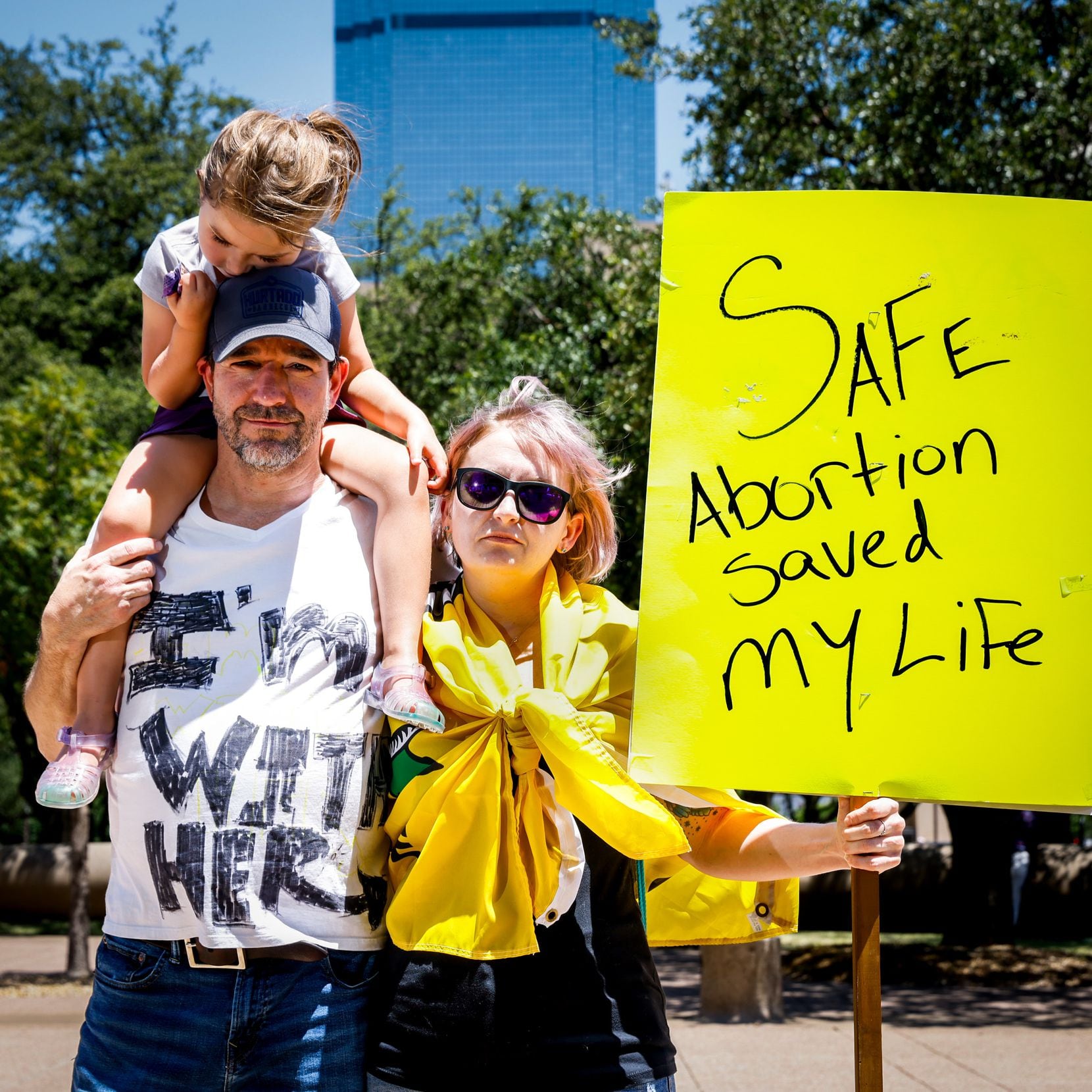 Andrea Huseman, 37, with her husband Andrew Ballenger, 46, and their daughter Emma...
