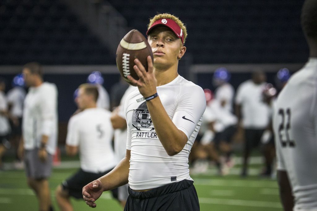 Quarterback Spencer Rattler, of Phoenix, tosses a ball around during the second day of The...