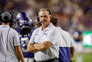 TCU head coach Sonny Dykes looks to the sideline during a timeout during the second half of...