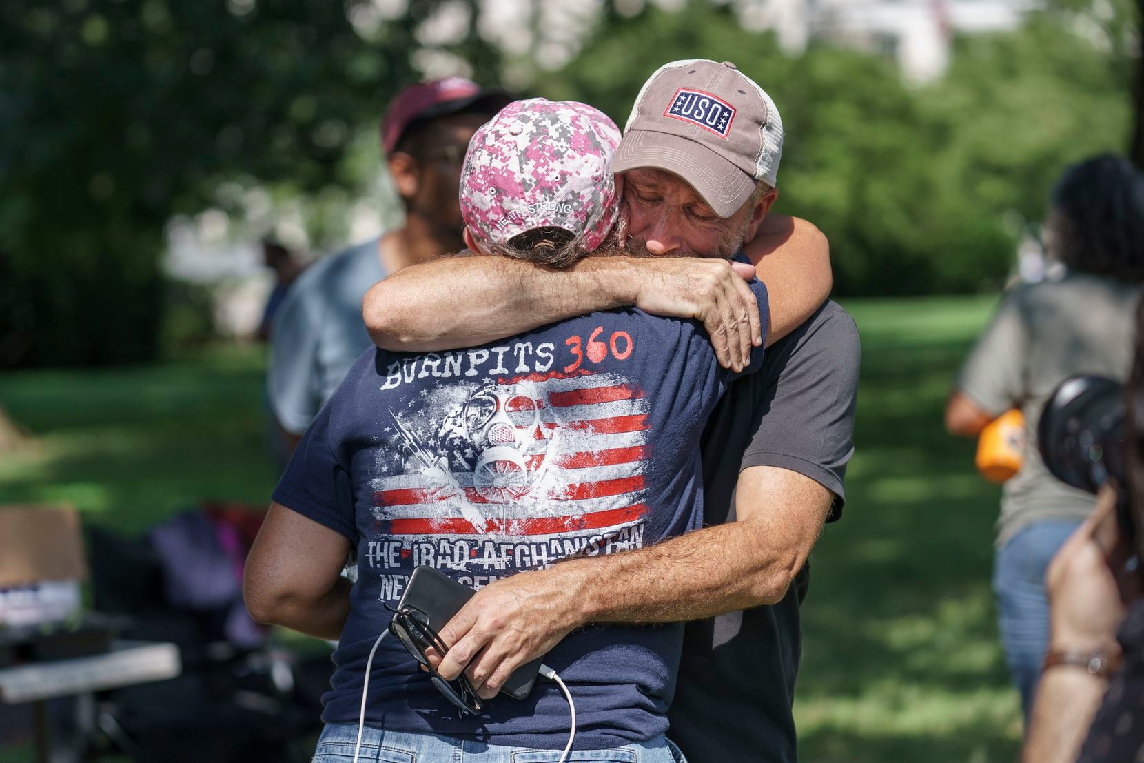 Activist and entertainer Jon Stewart hugged fellow advocate Susan Zeier of Sandusky, Ohio,...