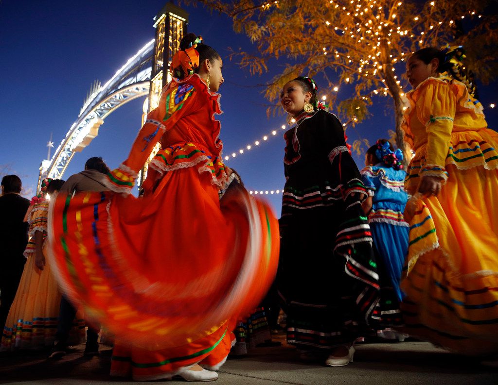 La Fe Folklorico dancers prepare to perform during the Paseo de Las Luces grand opening, Wednesday, November 7, 2018. The project is a $6.4 million investment in El Paso's downtown shopping district. It has long been the gateway to Juarez, Mexico leading to the bridge and its border crossing. They hope to do the same on the other side of the Rio Grande River enhancing the area between the Santa Fe International Bridge and San Jacinto Plaza. 