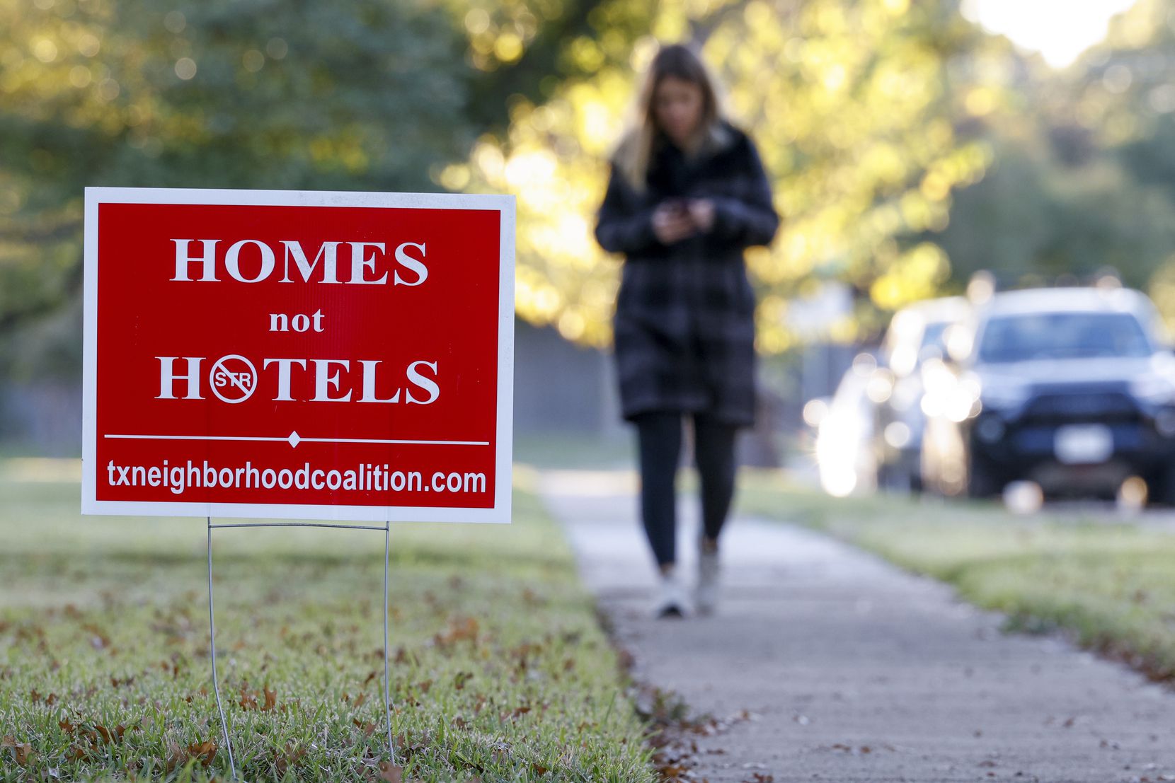A sign opposing short-term rentals is one of many in Far North Dallas, north of Arapaho Road...