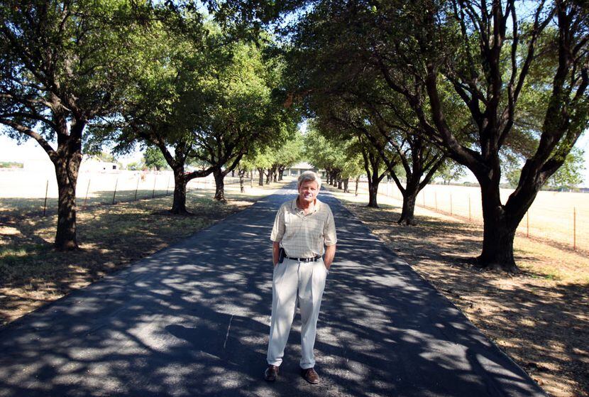 Rodney Haggard stands at the entrance to the Haggard farm in Plano on Sept. 27, 2011, before...