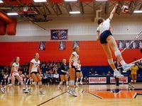 Frisco Wakeland's Jessica Jones spikes the ball during a match against Frisco Memorial on...