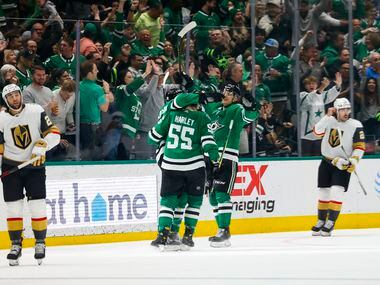 Dallas Stars left wing Jason Robertson (21) and teammates celebrate a goal against the Vegas...