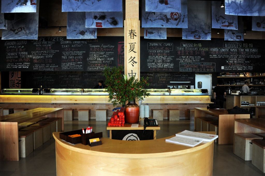 Guests can sit at either the community tables or the sushi bar at Sushi Bayashi in Trinity...