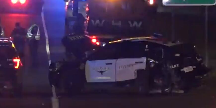 A Fort Worth police car was damaged by a suspected drunken driver.