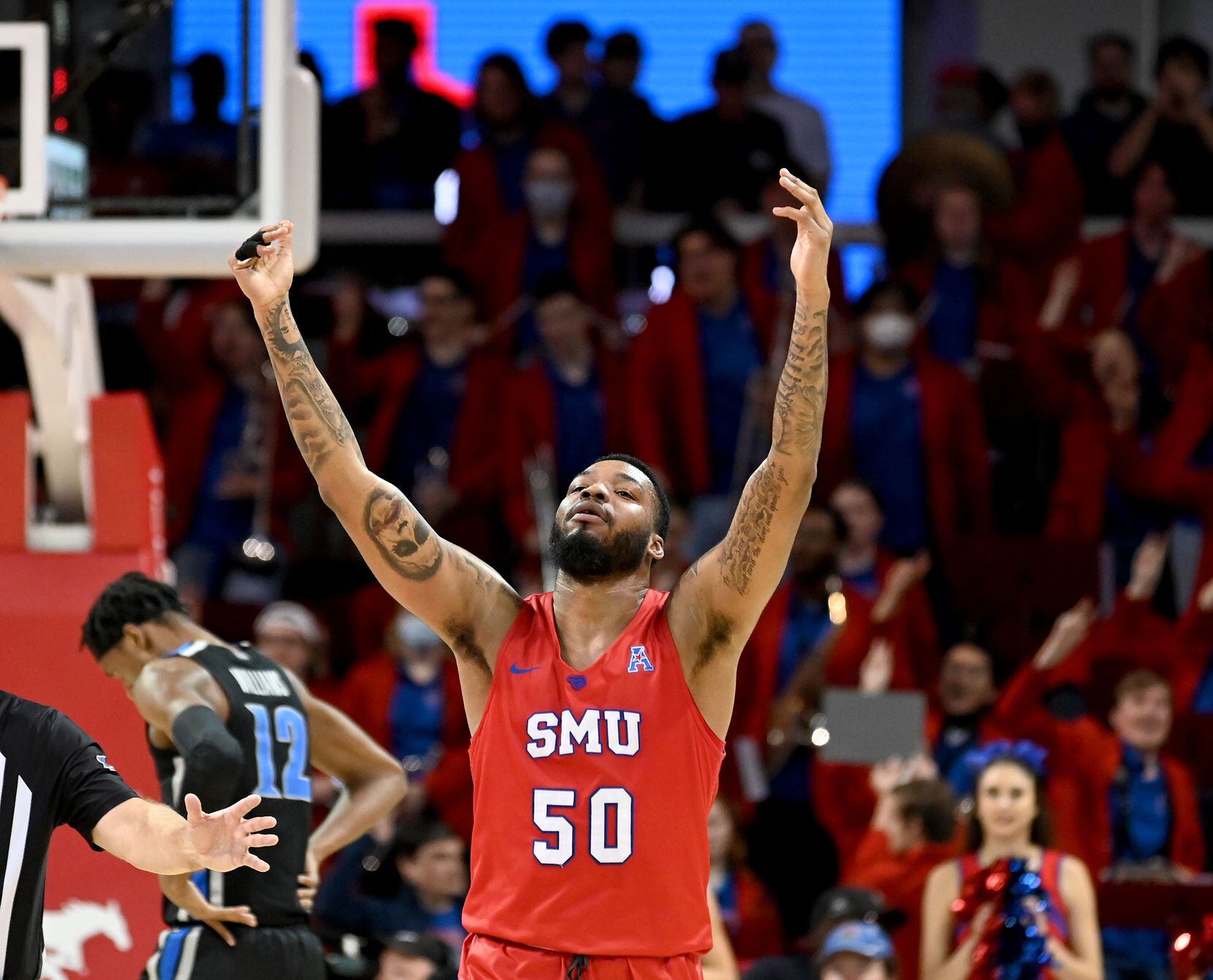 SMU forward Marcus Weathers (50) reacts after a timeout in the second half during a men’s...