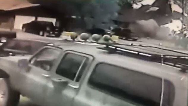 A house in Hurst can be seen exploding in the background in this raw footage obtained by...