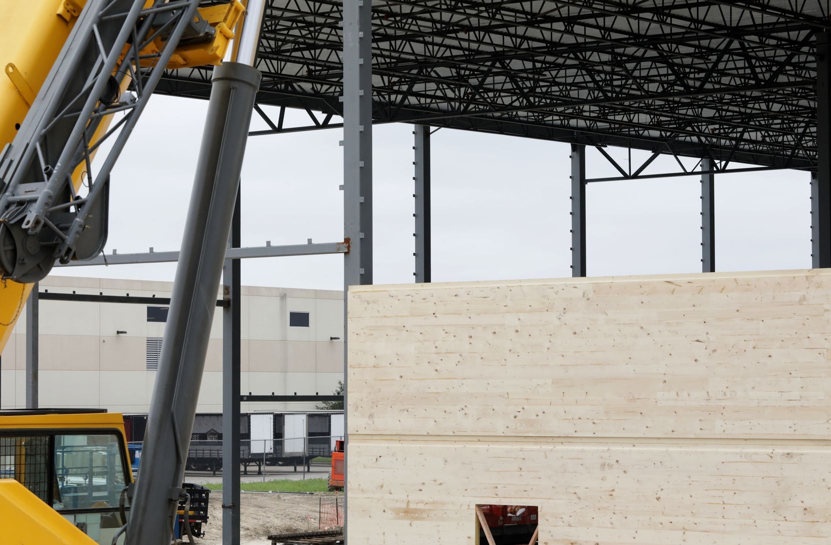 The exterior of the new warehouse is covered in 60-foot laminated timber panels.