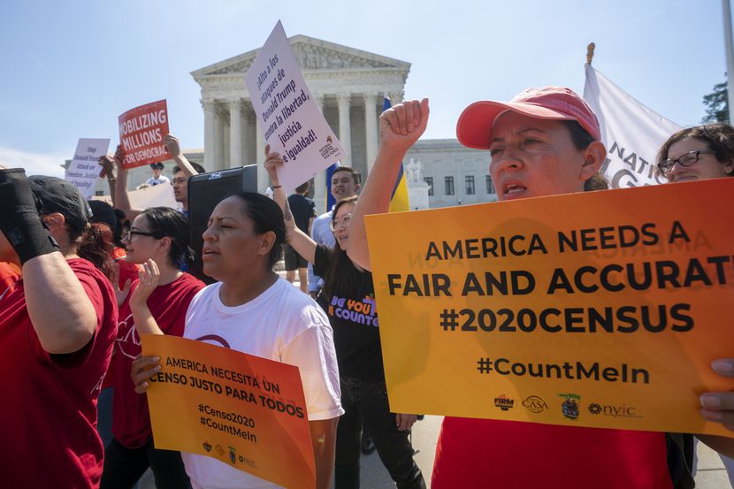 In this June 27, 2019, file photo, demonstrators gather at the Supreme Court on Capitol Hill...