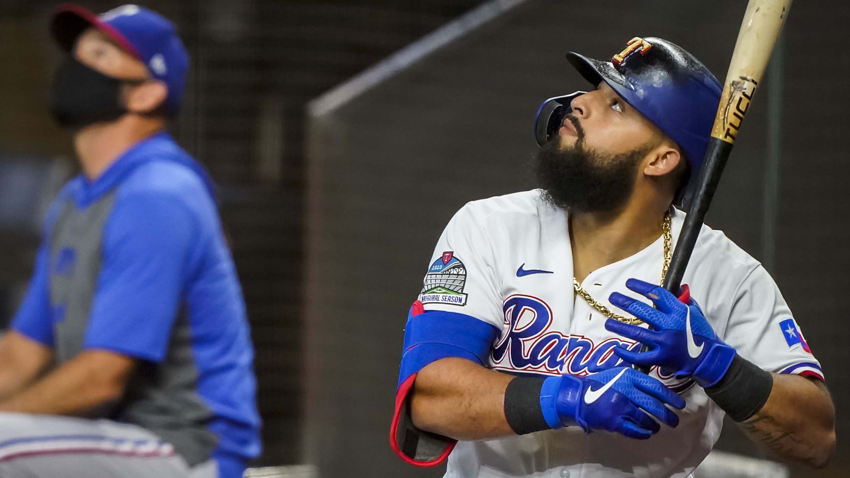 Second baseman Rougned Odor watches a foul ball from the on deck circle during Texas Rangers...