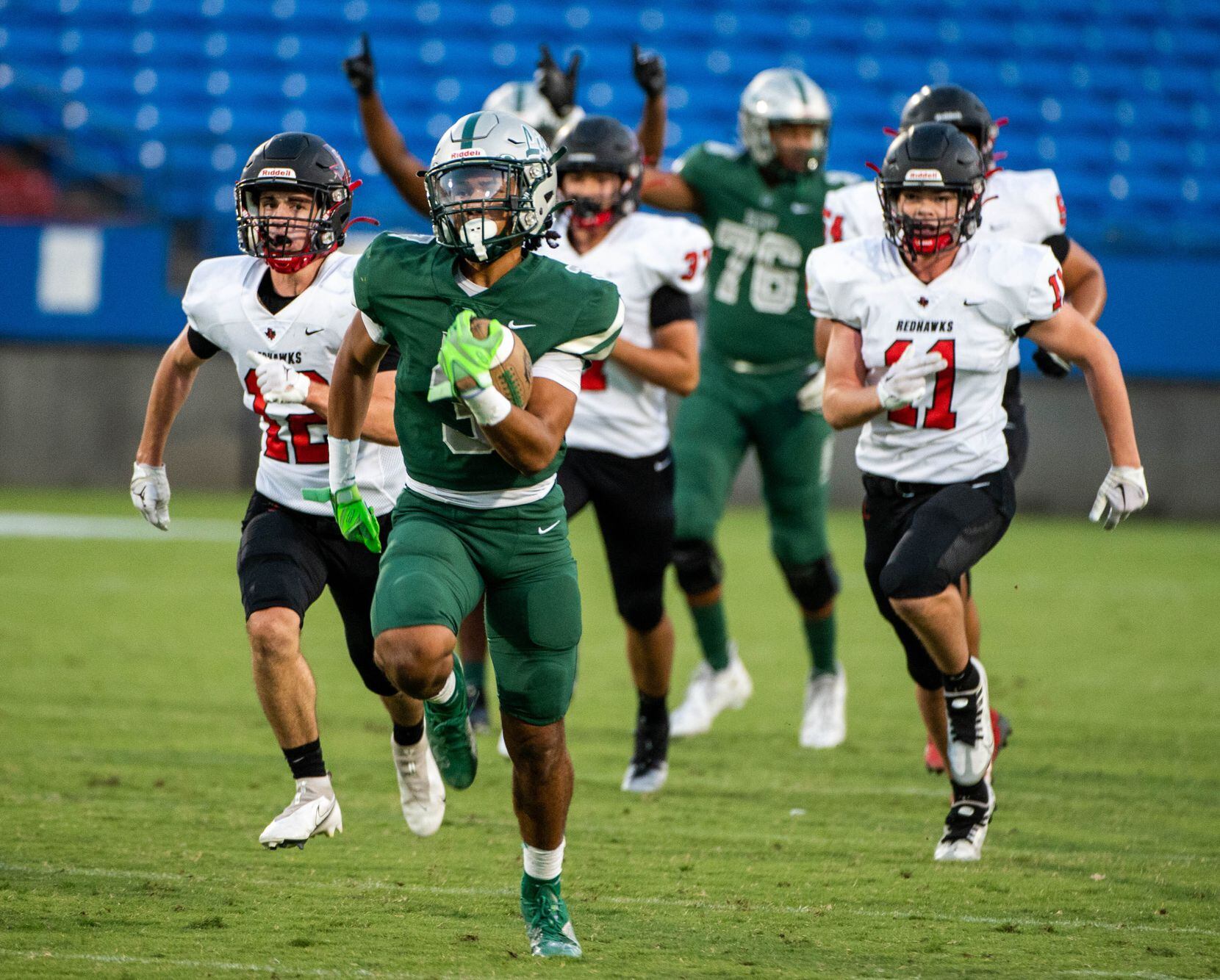Frisco Reedy's Dennis Moody (3) runs for a touchdown in the first half during a high school...