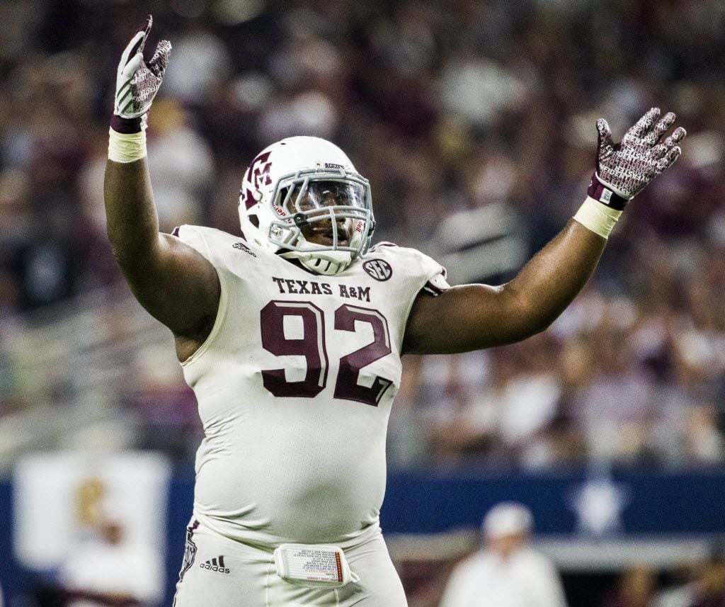 Texas A&M Aggies defensive lineman Zaycoven Henderson (92) tries to pump up the crowd during...