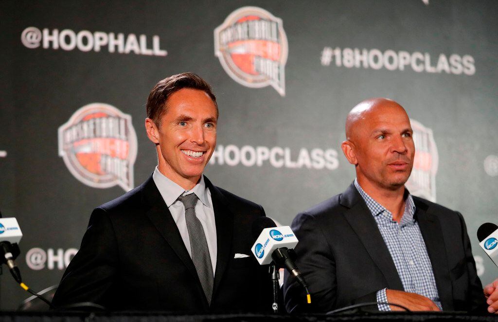 Former NBA player Steve Nash, left, smiles as former NBA player Jason Kidd, right, looks on...