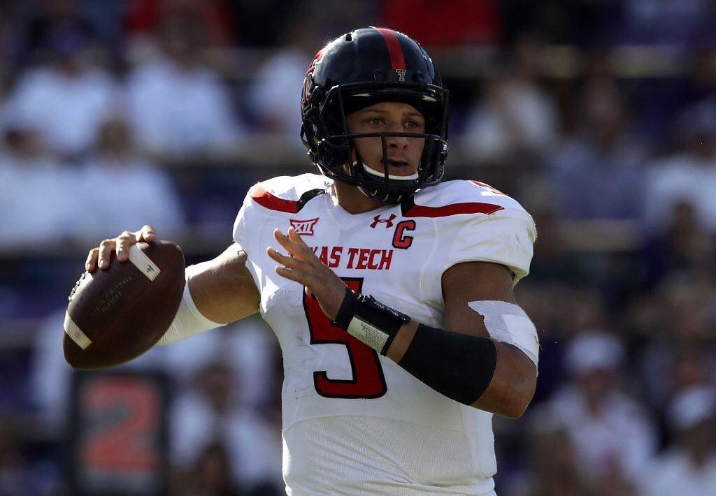 FORT WORTH, TX - OCTOBER 29:  Patrick Mahomes II #5 of the Texas Tech Red Raiders throws...