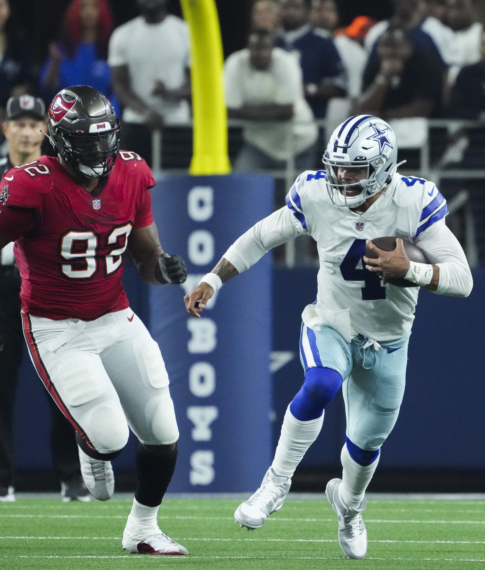 Dallas Cowboys quarterback Dak Prescott wears a Crucial Catch hat as he  warms up for an NFL football game against the Houston Texans, Sunday, Oct.  7, 2018, in Houston. (AP Photo/David J.