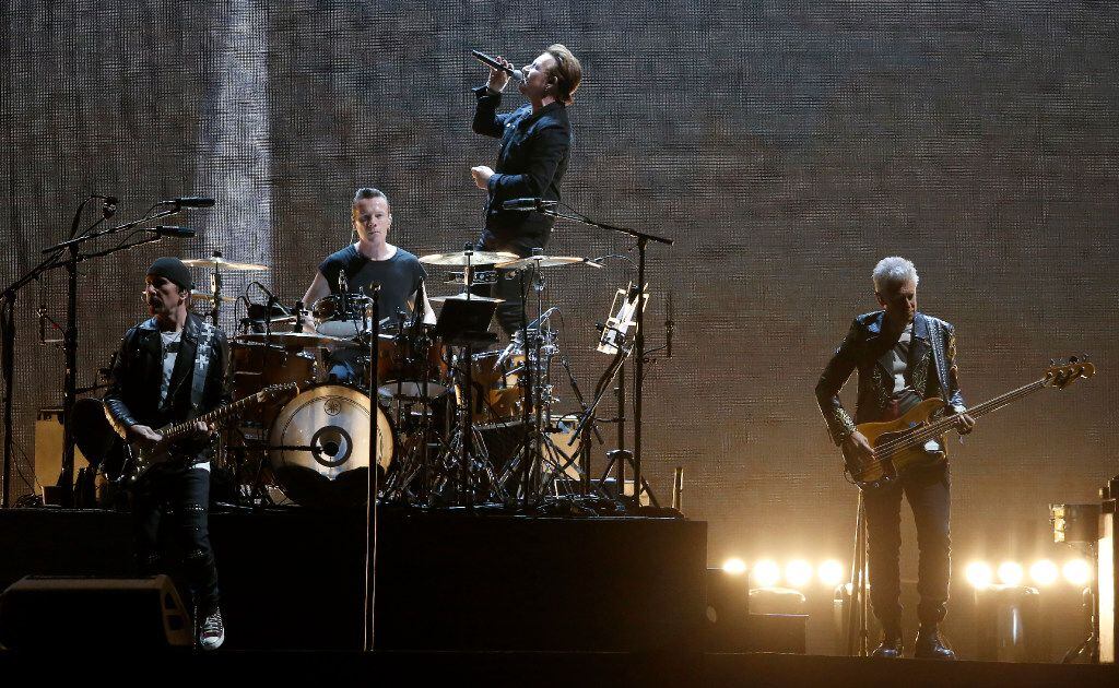 Members of U2 perform on stage at AT&T Stadium in Arlington, Texas, Friday, May 26, 2017....