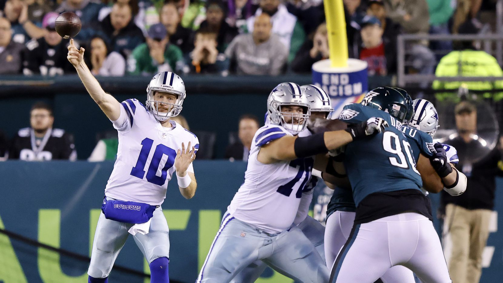 Dallas Cowboys quarterback Cooper Rush (10) throws a second quarter pass which was tipped...
