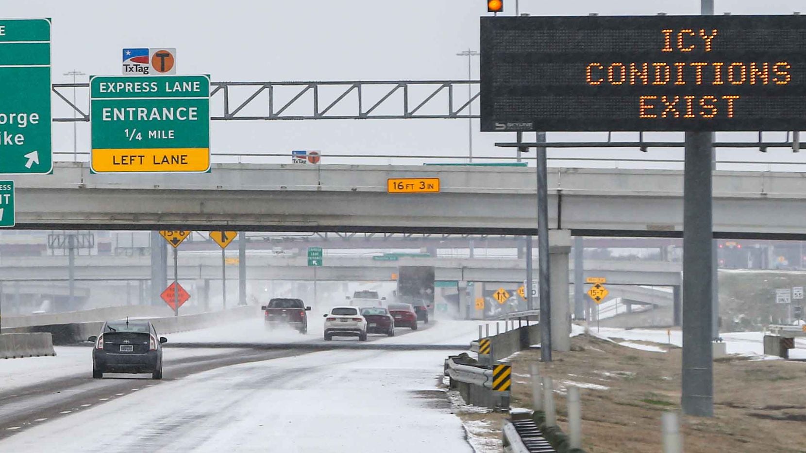 Traffic on Texas 114 TEXpress near MacArthur Blvd Winter flurries arrive in Irving on...