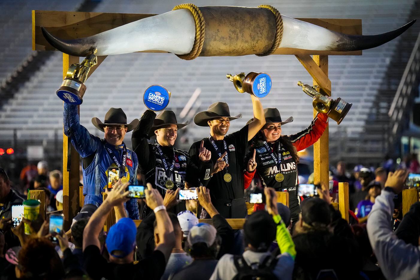 From left, Funny Car winner Ron Capps, Top Fuel winner Justin Ashley, Pro Stock Motorcycle...