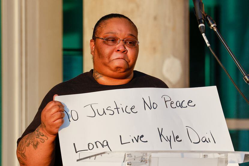 Kyle Dail’s sister Kinesha Dail, 40, talks about her brother during a protest outside the...