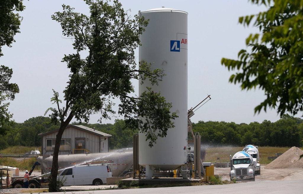 A concrete plant is located near a mobile home community on Wednesday in McKinney.