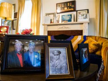 Photographs and other mementos belonging to Richard Overton, 111, are displayed in his home...