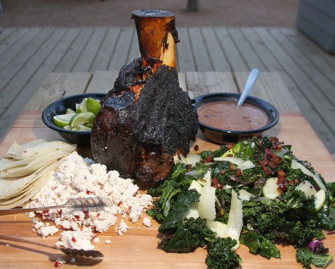 In your backyard, you serve 16-hour smoked beef shin with ricotta, borracho beans and kale...