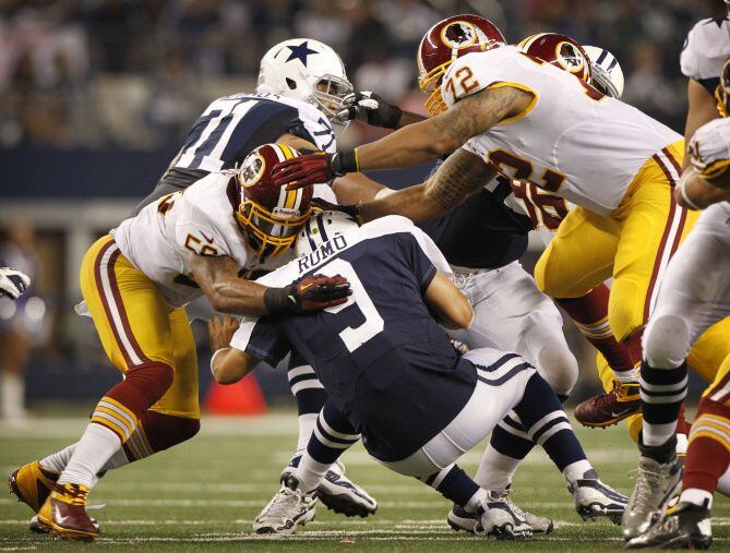 Washington Redskins inside linebacker Perry Riley (56) and Washington Redsk...