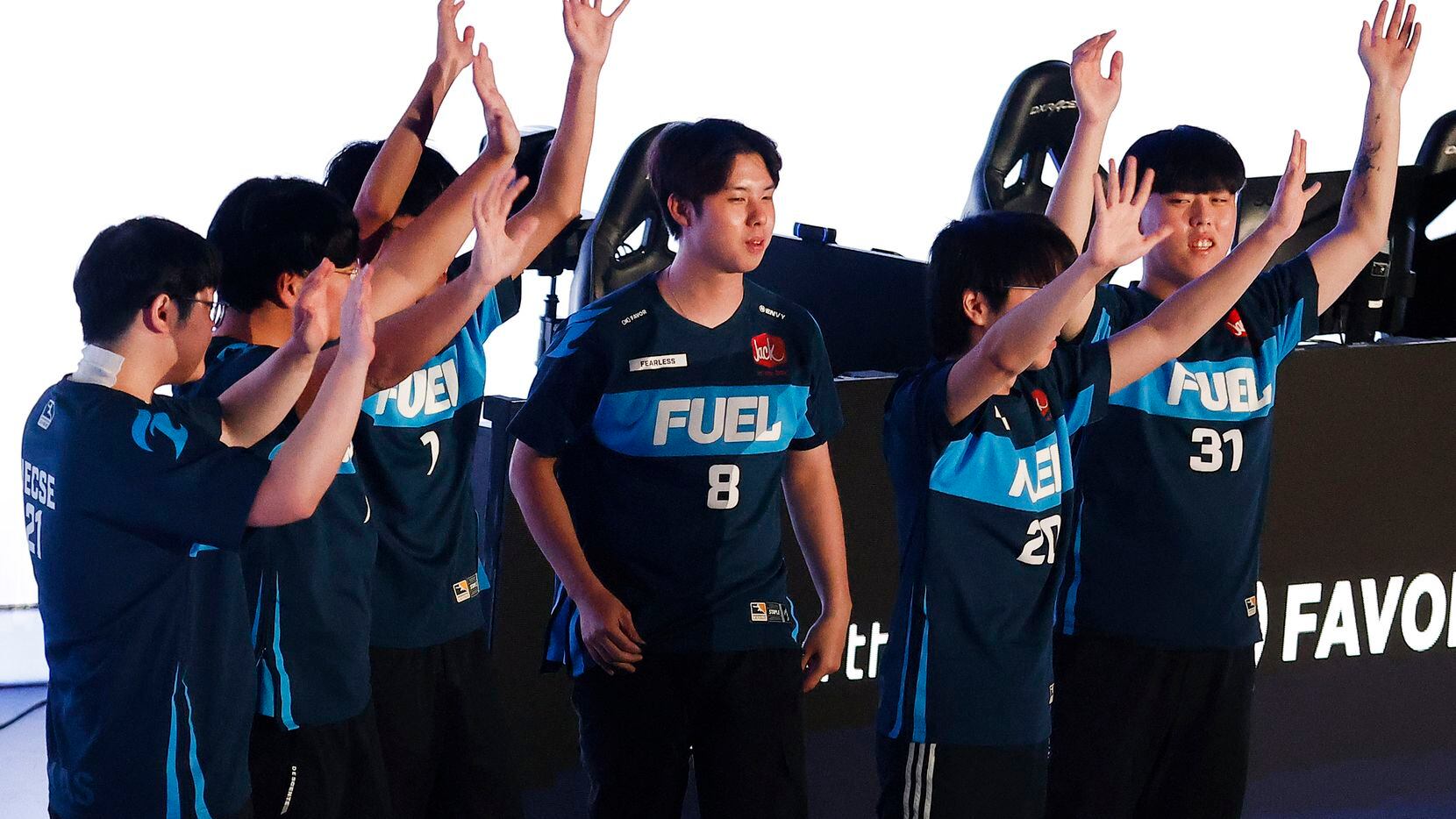 The Dallas Fuel team acknowledges their fans after defeating the Houston Outlaws in their...
