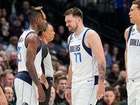 Dallas Mavericks guard Luka Doncic (77) reacts after being assessed a technical foul during...