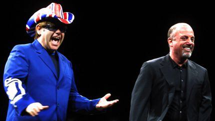 February, 28, 2003: Elton John, left, and Billy Joel greet the crowd at  at the American...