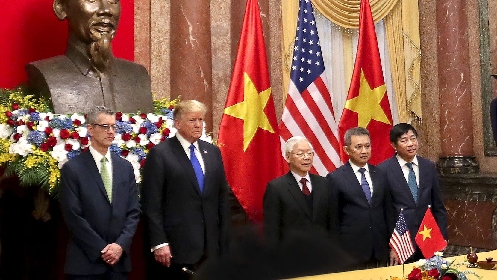 From left: Dave Shirk, president, Sabre Travel Solutions; President Donald Trump; Nguyen Phu...