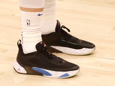 Dallas Mavericks guard Luka Doncic (77)  wears his signature shoes Luka 1 in a game against...