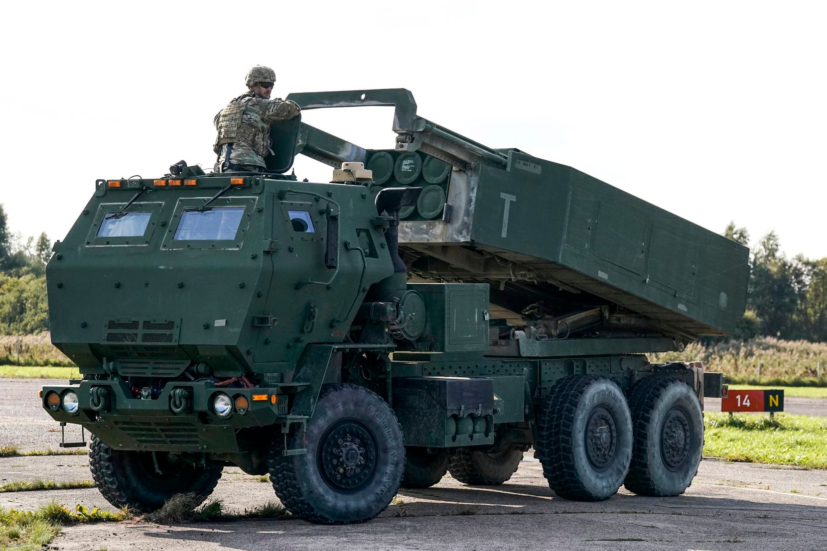 FILE - High-Mobility Artillery Rocket System (HIMARS) is in operation during military...