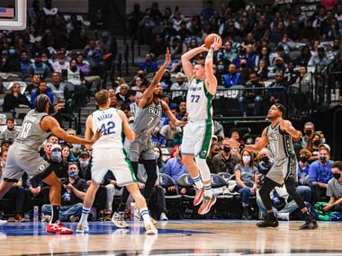 Dallas Mavericks guard Luka Doncic (77) goes for a shot against the Brooklyn Nets during the first half at the American Airlines Center in Dallas on Tuesday, December 7, 2021.