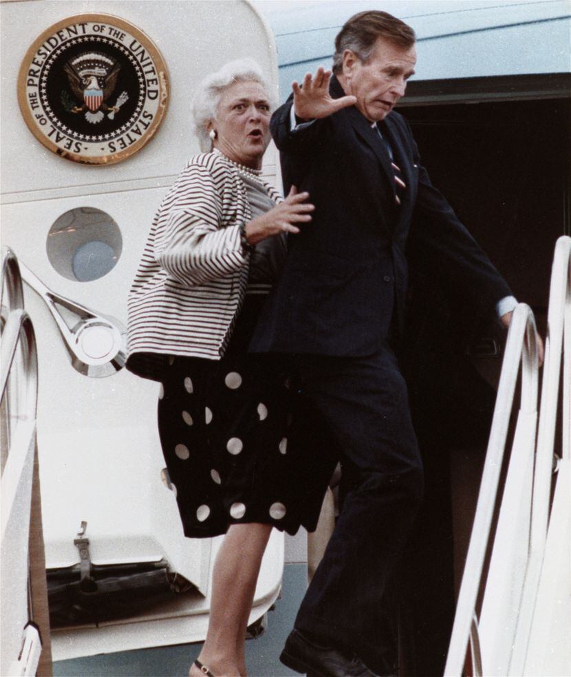 1989: First lady Barbara Bush reacts after President Bush accidentally stepped on her toe...