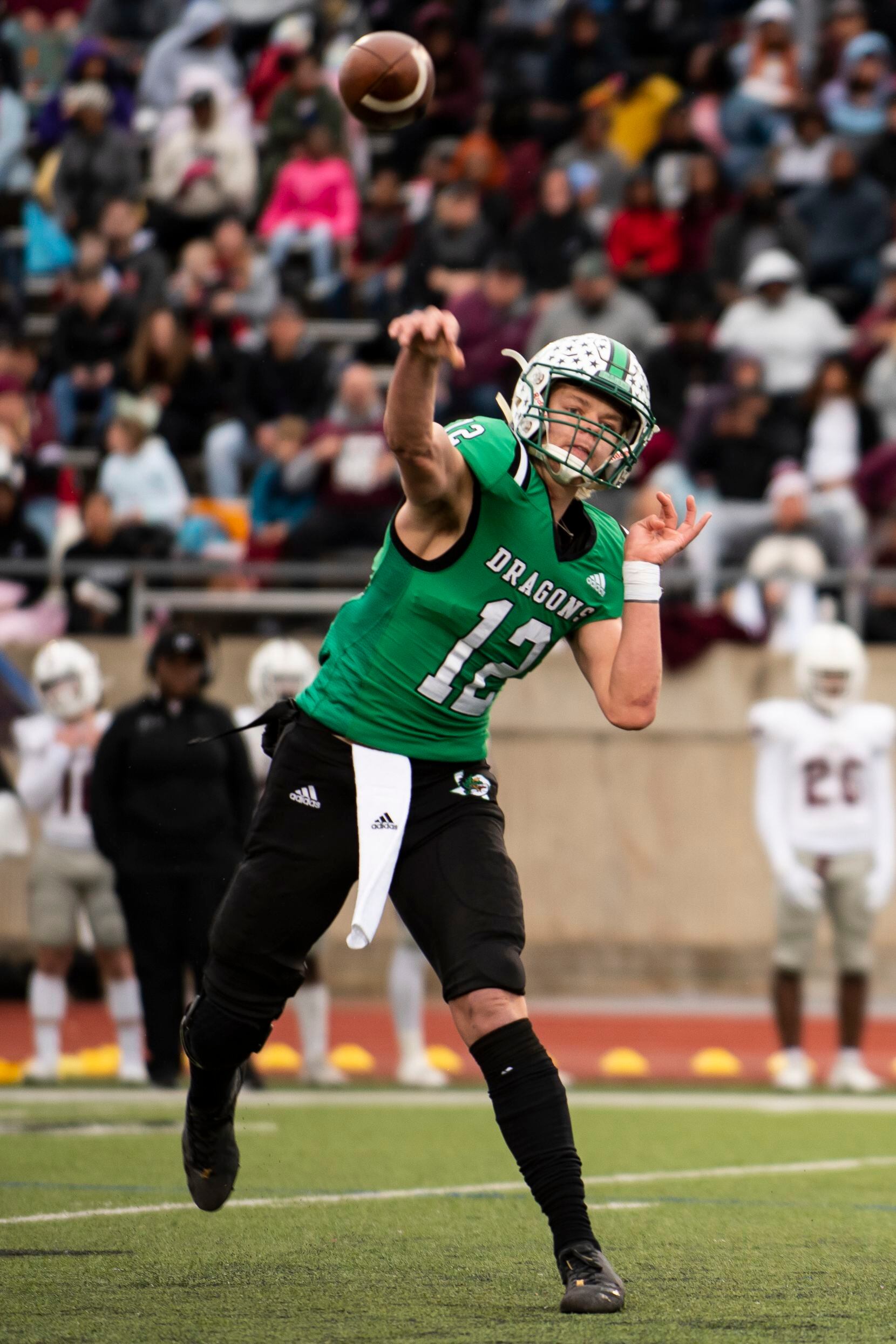 Southlake Carroll junior Kaden Anderson (12) passes the ball to a teammate during the Class...