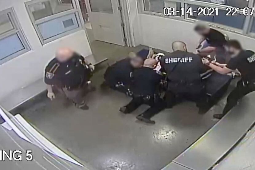 This image taken from video released by the Collin County Sheriff’s Office shows jailers...